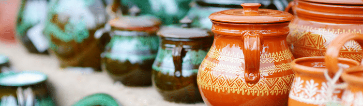 A table of pottery for sale.