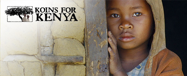 Koins For Kenya. A Kenyan child stands in a doorway.