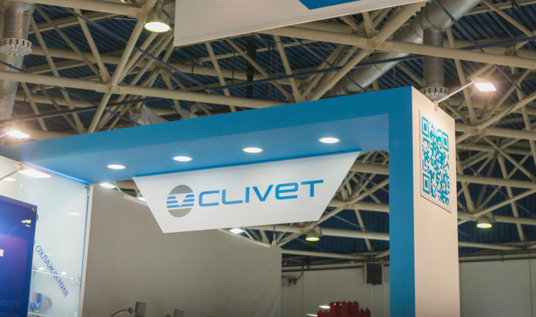 A sign that reads "Clivet" in all caps is above a trade show booth. Having clear signage for your brand is an essential part of trade show planning.