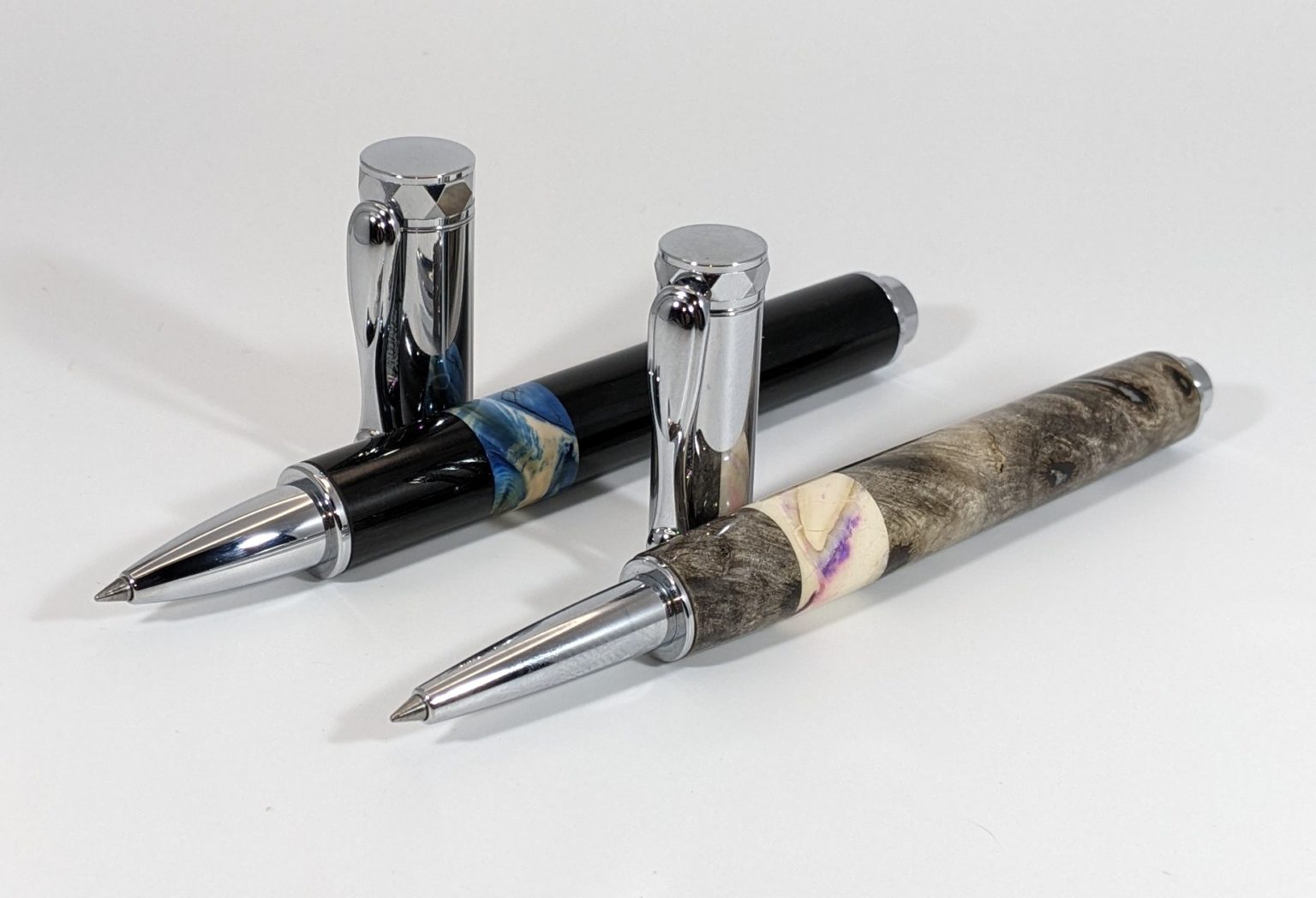 A close of shot of two pens Scott has handcrafted.